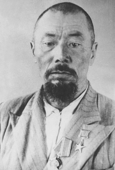 Е. Еримбетов